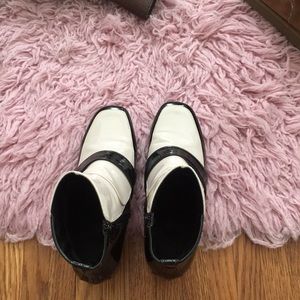 Patent leather ivory and black healed boots